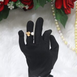 Pearl Ring with Floral Design - A stunning pearl ring featuring a delicate floral motif, blending timeless elegance with nature-inspired beauty.