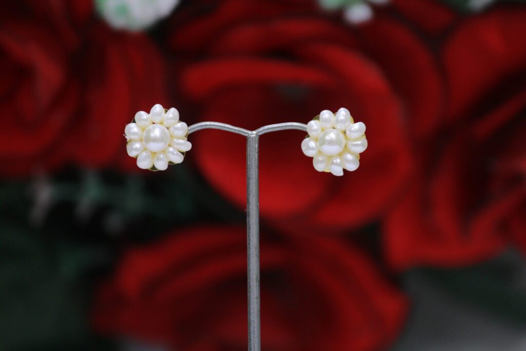 Pearl Flower Stud Earrings - Elegant floral design featuring pearls and intricate craftsmanship for a timeless look.