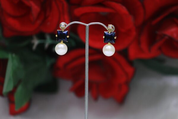 Blue Stone and Pearl Drop Earrings - Elegant design with vibrant blue stones and luminous pearls for a timeless, sophisticated look.