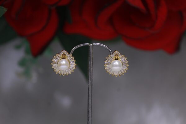 Pearl Stud Earrings with Crystal Halo - Elegant pearl studs surrounded by a sparkling crystal halo for a timeless and sophisticated design.