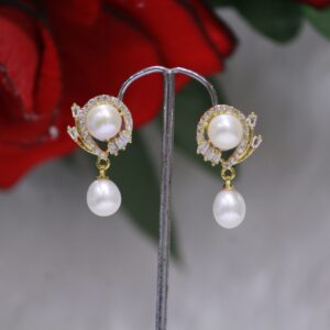 Pearl Drop Earrings with Crystal Leaf Design - Elegant pearl drops paired with a sparkling crystal leaf design for a timeless and nature-inspired look.