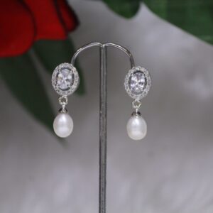 Pearl Drop Earrings with Oval Design - Elegant earrings featuring radiant pearl drops and a sophisticated oval design, perfect for timeless and stylish looks.