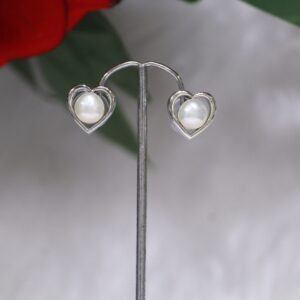 Pearl Stud Earrings with Heart Design - Elegant pearl stud earrings featuring a charming heart-shaped design for a timeless and romantic look.