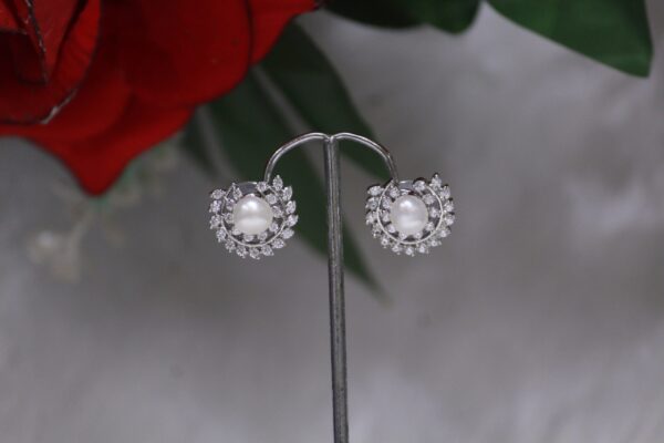 Pearl Stud Earrings - Timeless elegance with luminous pearls in a minimalist stud design.