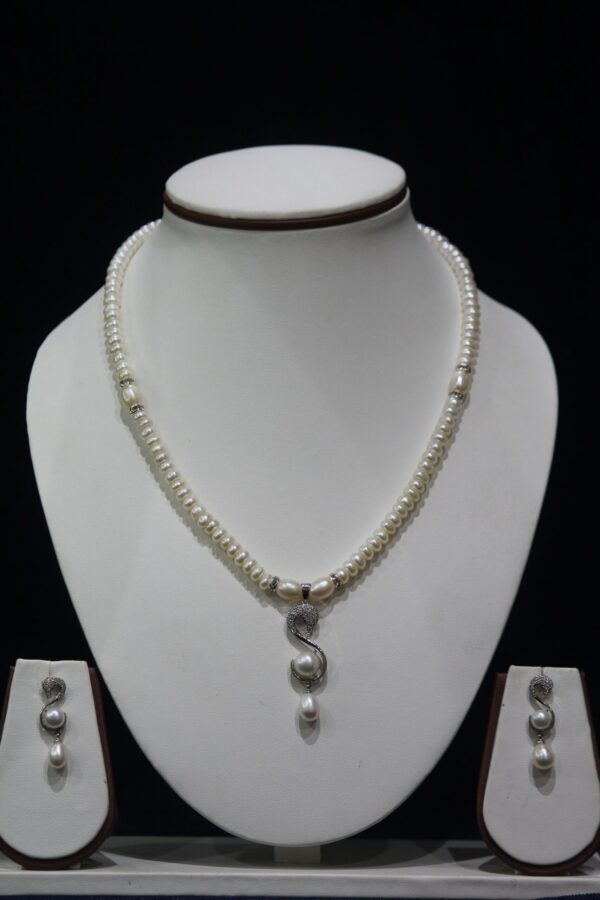 Pearl Necklace Set with S-Shape Pendant - A sophisticated pearl necklace set featuring a unique S-shape pendant, perfect for adding elegance to any look.