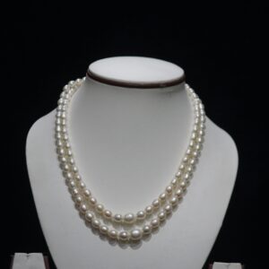 Two-Layered Pearl Necklace Set - A chic and elegant two-layer pearl necklace set, perfect for elevating your style with its graceful, layered design.