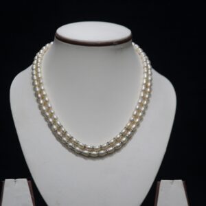 Two-Layered Pearl Necklace Set - A sophisticated two-layer pearl necklace set that combines timeless elegance with modern design for any special occasion.