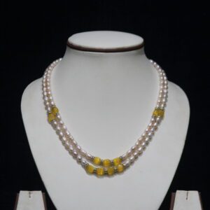 Pearl Necklace Set with Yellow Stone Accents - A refined and elegant pearl necklace set featuring vibrant yellow stone accents, perfect for adding a touch of color to your look.