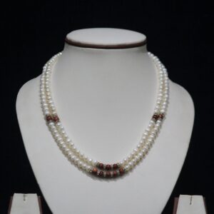 Pearl Necklace Set with Wooden Beads - A stylish combination of lustrous pearls and earthy wooden beads, creating a unique and fashionable necklace set.