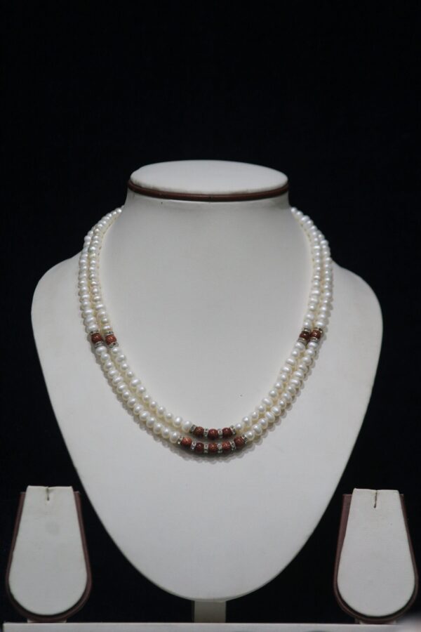 Pearl Necklace Set with Wooden Beads - A stylish combination of lustrous pearls and earthy wooden beads, creating a unique and fashionable necklace set.
