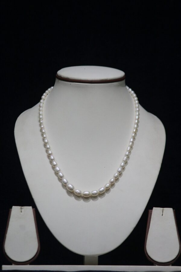 Unique Pearl Necklace - A one-of-a-kind pearl necklace featuring distinctively shaped pearls, offering a sophisticated and elegant design that stands out.