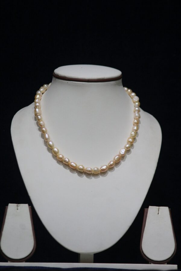 Baroque Pearl Necklace Set - A unique and elegant necklace set featuring irregularly shaped Baroque pearls, offering a bold, artistic design for a statement look.