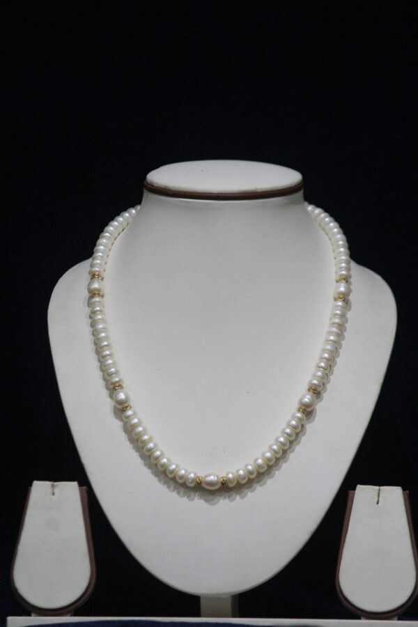 Pearl Necklace Set with Golden Beads - A stunning necklace featuring lustrous pearls accented with radiant golden beads and matching earrings.