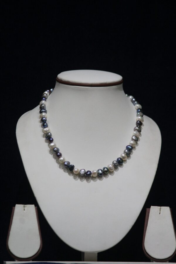 Multicolor Pearl Necklace Set - A vibrant and elegant jewelry set featuring multicolored pearls, perfect for adding a pop of color and sophistication to any outfit.