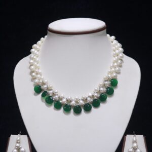 Pearl necklace set with green stone accents for a chic and vibrant look.