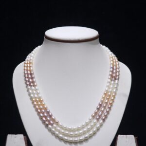 Three-layered multicolor pearl necklace set featuring vibrant pearls for a bold and stylish look.