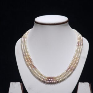 Three-layered multicolor pearl necklace set featuring vibrant pearls arranged in a stunning layered design for a sophisticated and unique look.
