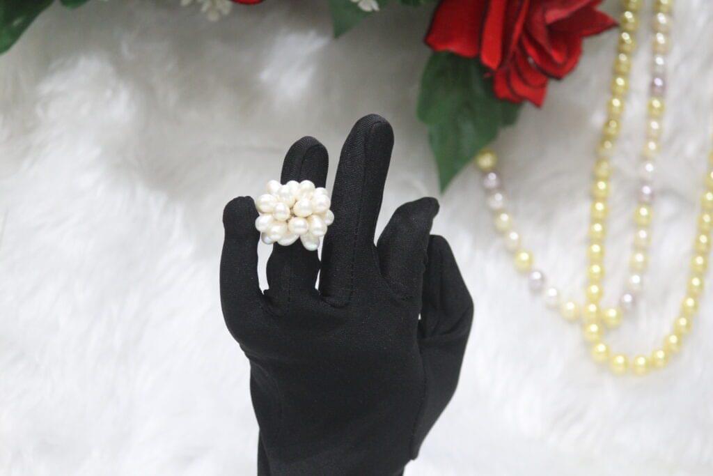 Pearl Cluster Ring - A dazzling ring featuring a cluster of luminous pearls, embodying timeless elegance and a sophisticated design for every occasion.