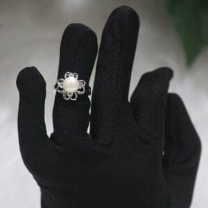Pearl Ring with Floral Design - Elegant pearl ring featuring a delicate floral pattern, perfect for weddings, special occasions, or everyday elegance.