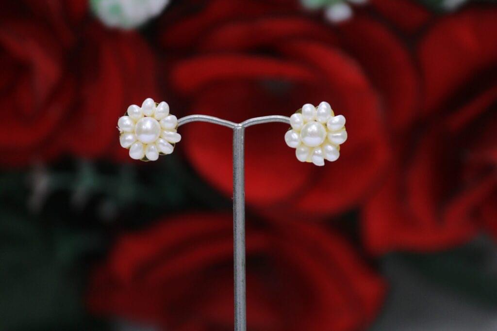 Pearl Flower Stud Earrings - Elegant floral design featuring pearls and intricate craftsmanship for a timeless look.