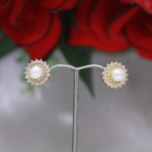 Pearl Stud Earrings with Crystal Halo - Elegant pearl studs featuring a stunning crystal halo for a timeless and sophisticated design.