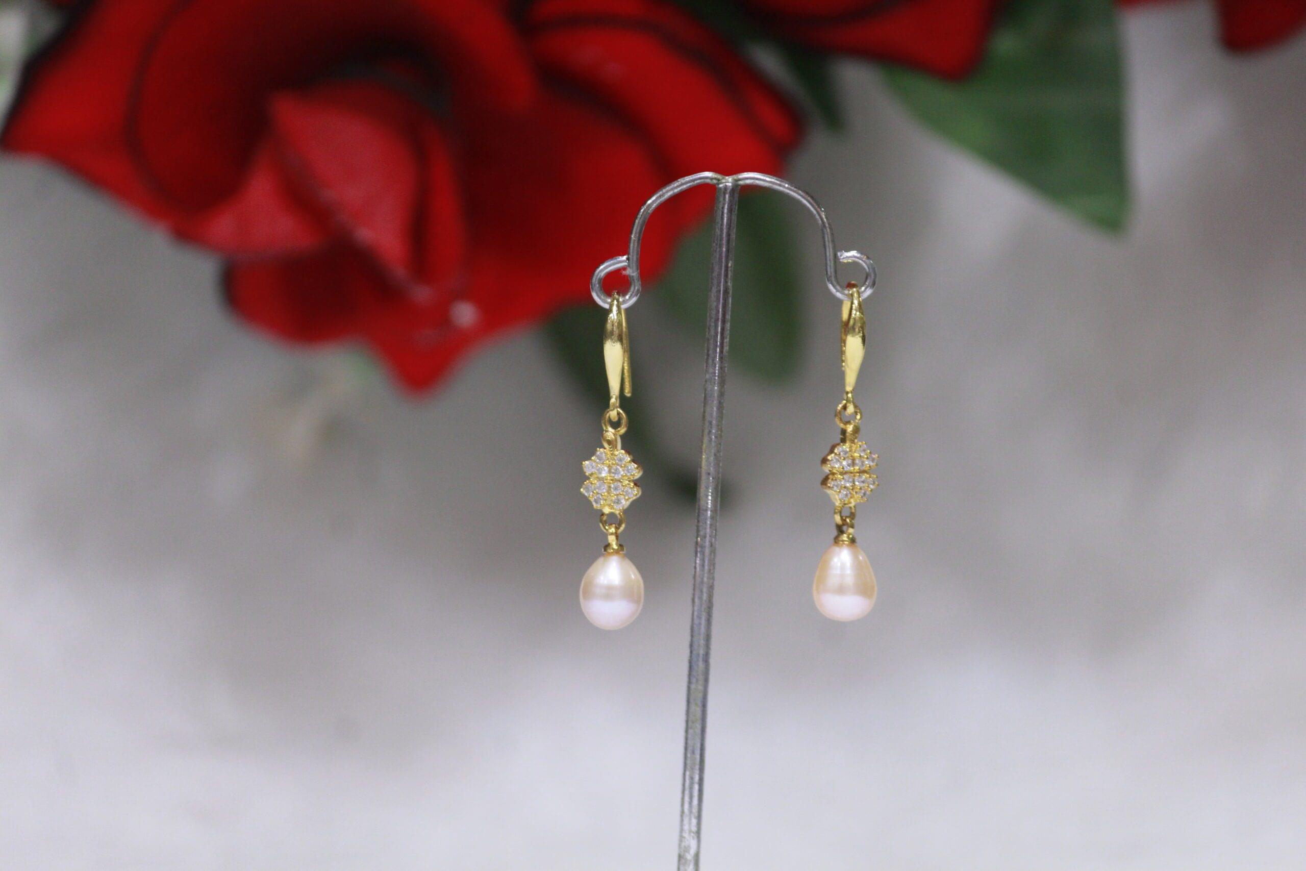 Pearl Drop Earrings with Crystal Ball Design - Elegant pearl drops paired with a stunning crystal ball for a timeless and sophisticated look.