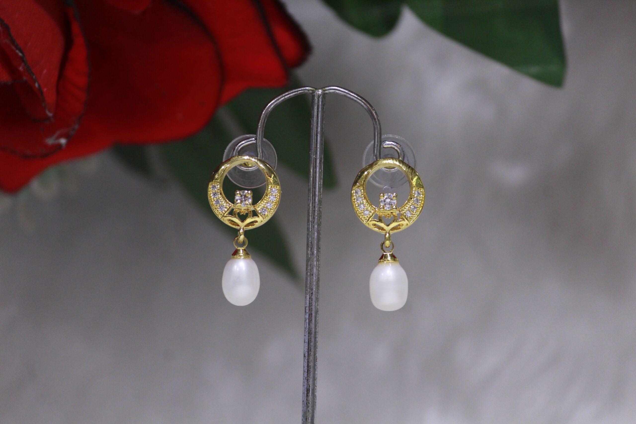 Pearl Drop Earrings - Timeless and elegant earrings featuring luminous pearl drops, perfect for adding sophistication to any outfit or occasion.