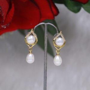Pearl Drop Earrings - Classic and elegant pearl drop earrings, perfect for adding timeless charm to any outfit.