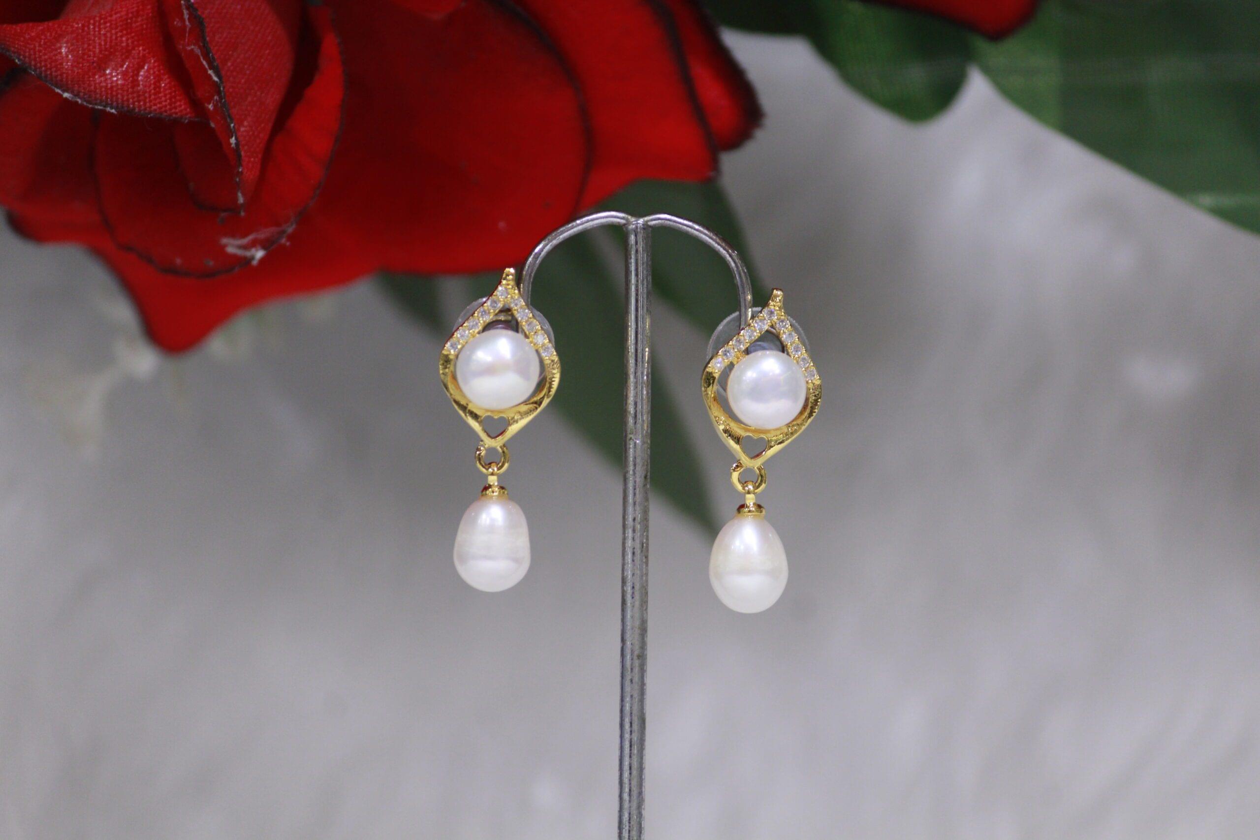 Pearl Drop Earrings - Classic and elegant pearl drop earrings, perfect for adding timeless charm to any outfit.