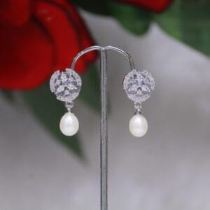 Pearl Drop Earrings with Circular Design - Elegant earrings featuring a radiant pearl drop and a sleek circular design, perfect for timeless sophistication.