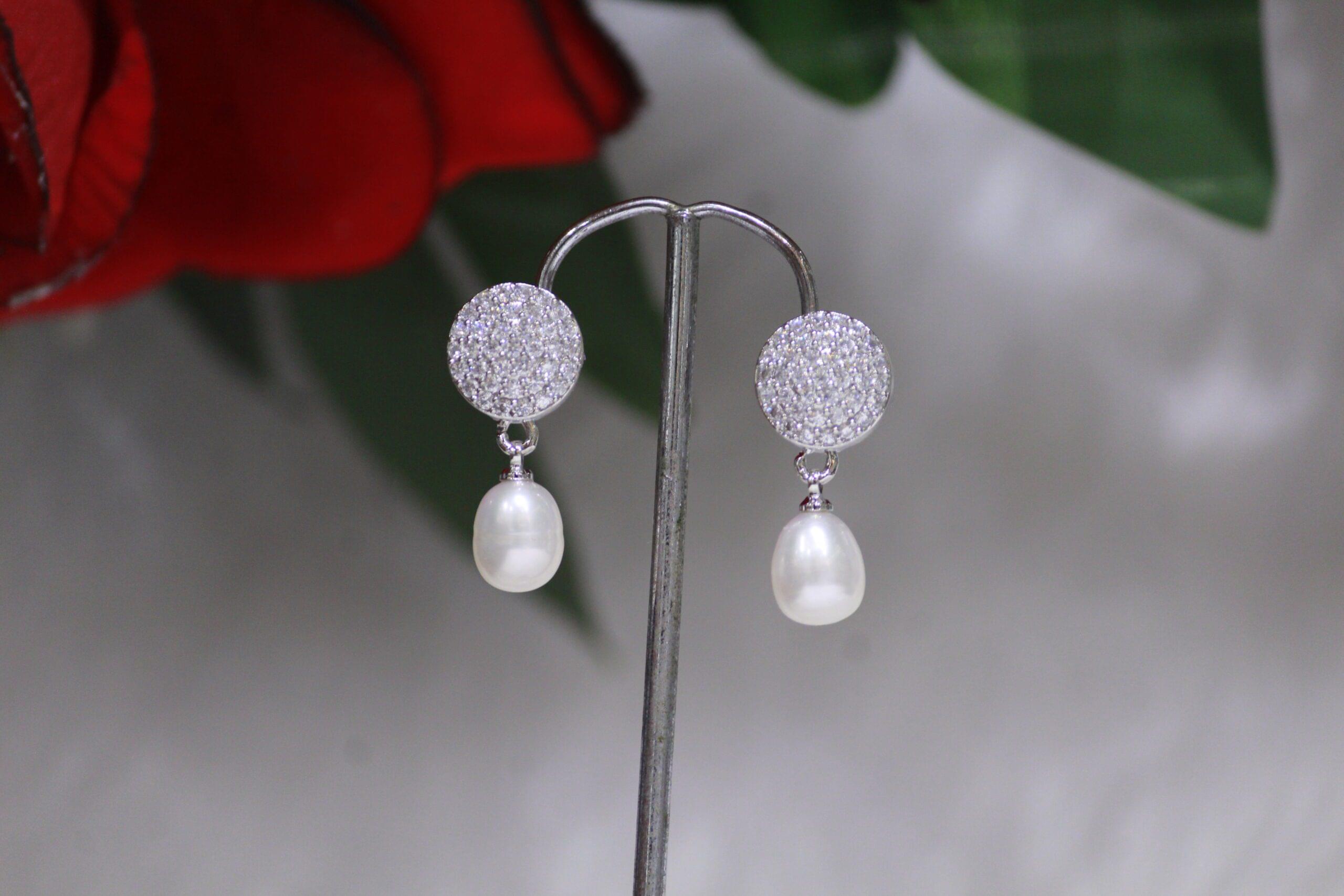 Pearl Drop Earrings with Circular Design - Elegant pearl drop earrings featuring a minimalist circular design for versatile and timeless style.
