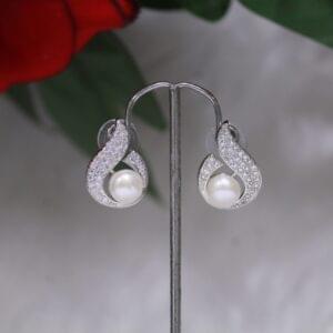 Pearl Stud Earrings - Classic and elegant pearl studs for a timeless look.