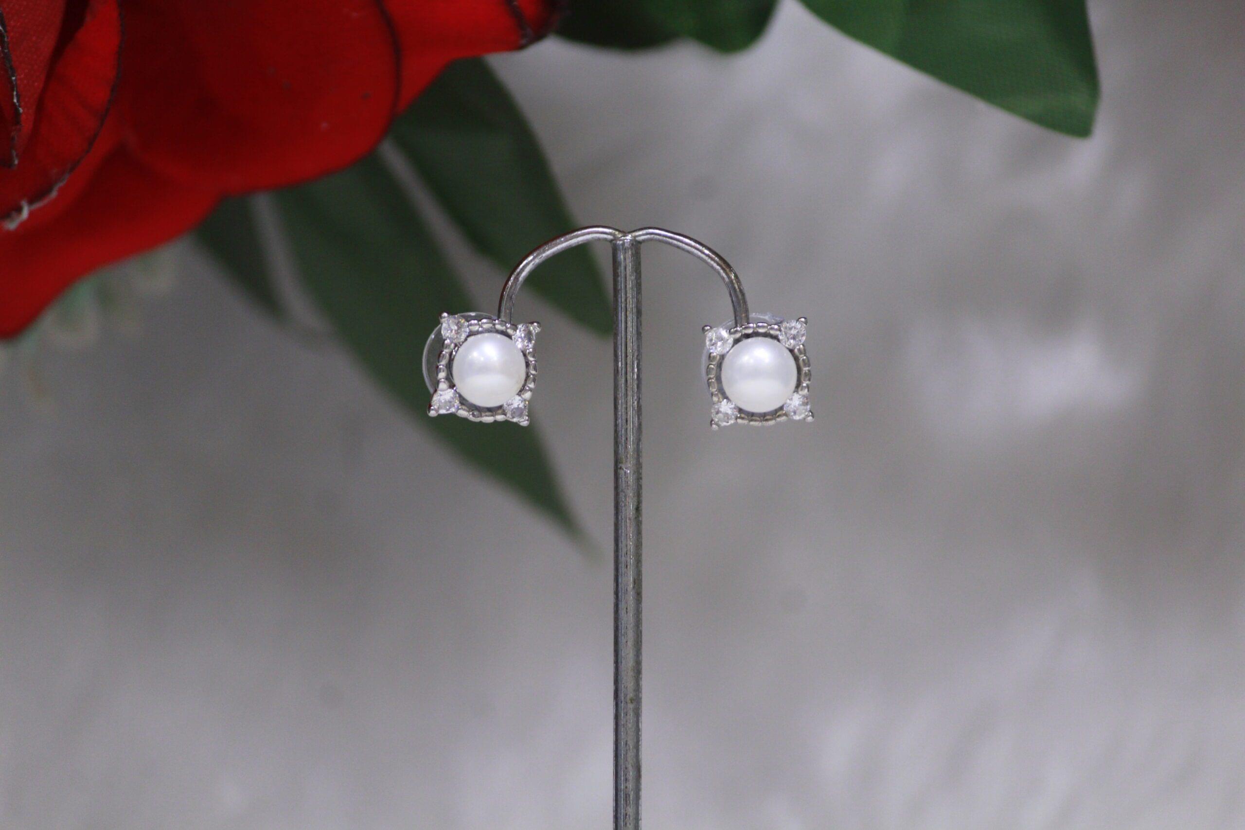 Pearl Stud Earrings with Square Design - Elegant pearl stud earrings featuring a modern square design for timeless beauty and style.