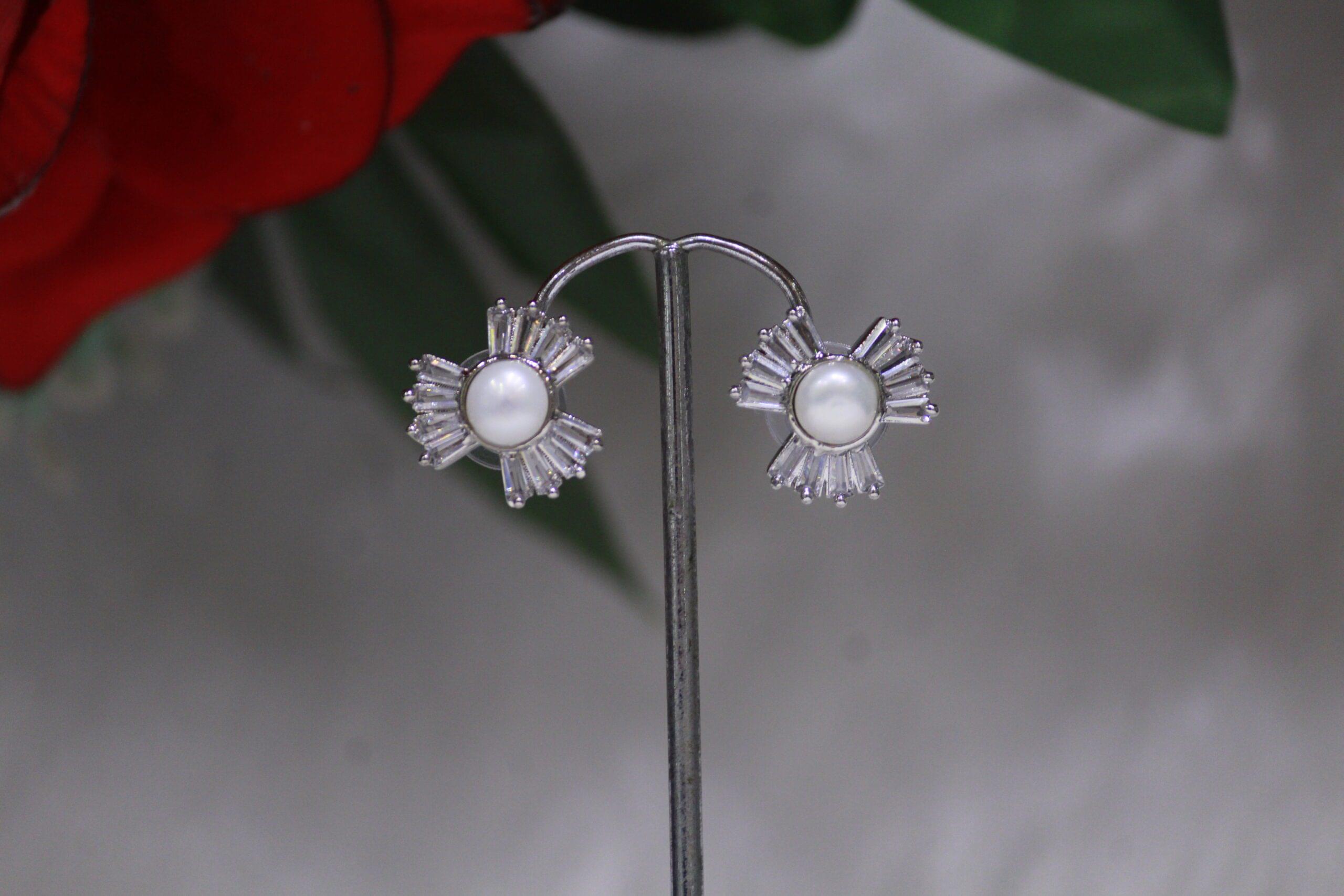 Pearl Stud Earrings with Starburst Design - Elegant pearl studs featuring a stunning starburst pattern for a chic, timeless, and versatile accessory.