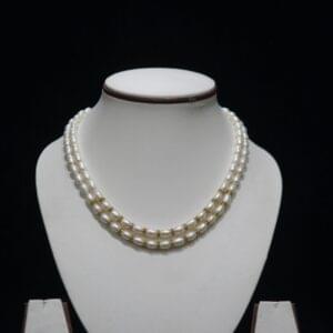 Double-Layer Pearl Necklace - A stunning double-layer pearl necklace designed to add a touch of sophistication and elegance to any outfit.