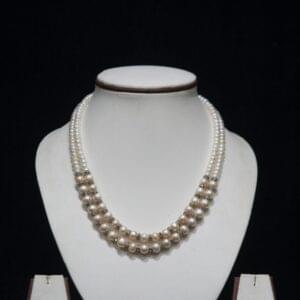 Two-Layered Pearl Necklace Set - A stunning double-layer pearl necklace that offers a sophisticated and elegant look, perfect for any formal or casual occasion.