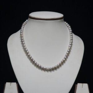 Keshi Pearl Necklace Set - A stunning necklace set featuring Keshi pearls, known for their organic shapes and natural luster, offering a unique and luxurious design.
