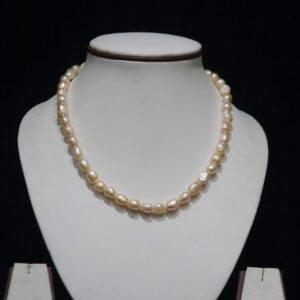 Baroque Pearl Necklace Set - A unique and elegant necklace set featuring irregularly shaped Baroque pearls, offering a bold, artistic design for a statement look.