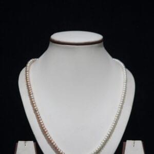 Two-Tone Pearl Necklace Set - A sophisticated jewelry set featuring a blend of two-tone pearls, offering a modern twist on classic elegance.