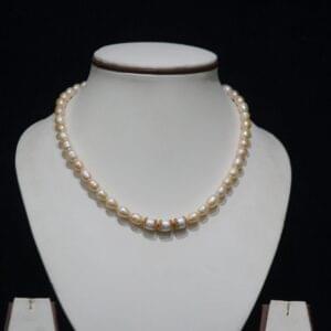 Pearl Necklace Set with Golden Beads - A sophisticated jewelry set featuring lustrous pearls combined with golden beads, ideal for formal and festive occasions.
