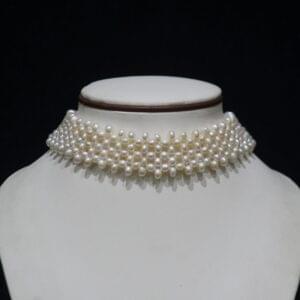Pearl Choker Necklace - A sophisticated choker featuring lustrous pearls, designed for a timeless and elegant look suitable for any occasion.